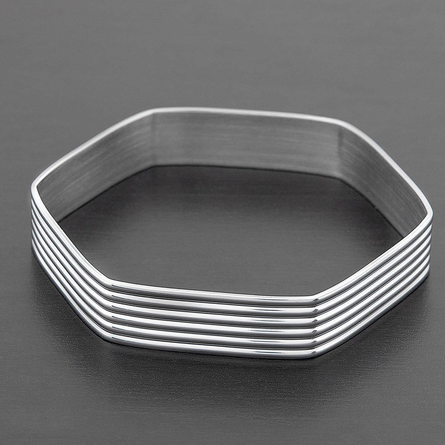 ELYA Women's Grooved Geometric Steel Bangle Bracelet