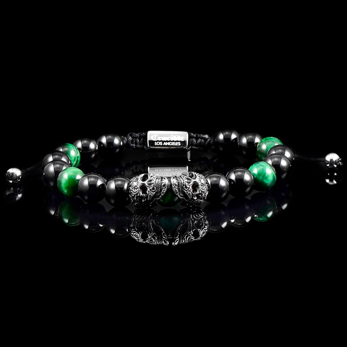 Crucible Jewelry Double Skull Adjustable Bracelet with Green Tiger Eye and Black Onyx Beads