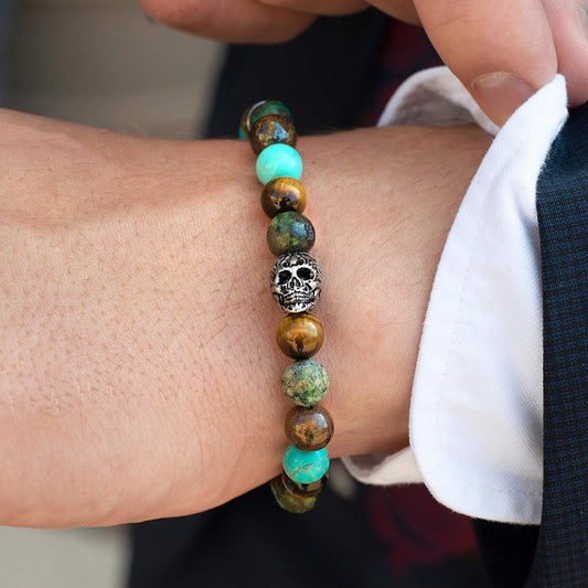 Crucible Jewelry Single Skull Stretch Bracelet with 8mm Tiger Eye, Genuine Turquoise, African Turquoise and Bronzite Beads