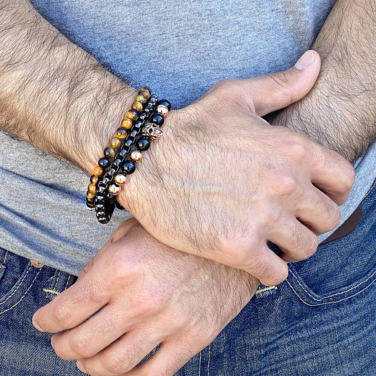 Crucible Jewelry Polished Stainless Steel Skull and Polished Black Onyx Strech Bracelet