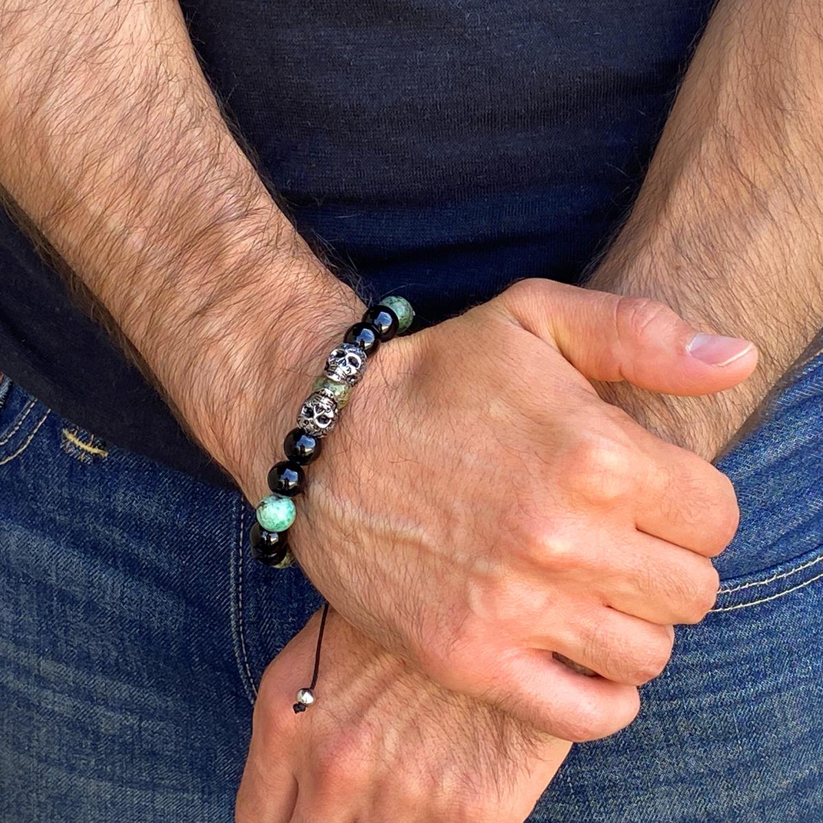 Double Skull Adjustable Bracelet with Genuine African Turquoise and Black Onyx Beads