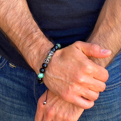 Double Skull Adjustable Bracelet with Genuine African Turquoise and Black Onyx Beads