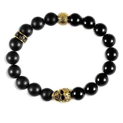 Crucible Jewelry Single Gold Skull Stretch Bracelet with 10mm Matte and Polished Black Onyx Beads