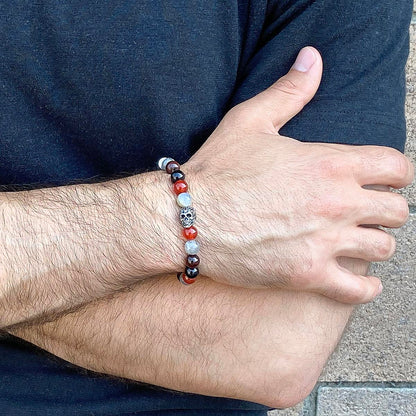 Crucible Jewelry Single Skull Stretch Bracelet with 8mm Polished Black Onyx, Labradorite Red Tiger Eye and Red Agate Beads