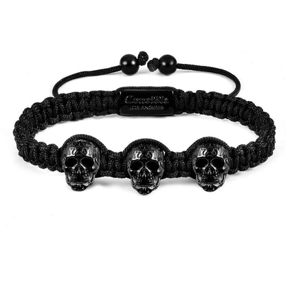 Crucible Jewelry Three Black IP Skulls on Shocker Tie Woven Bracelet