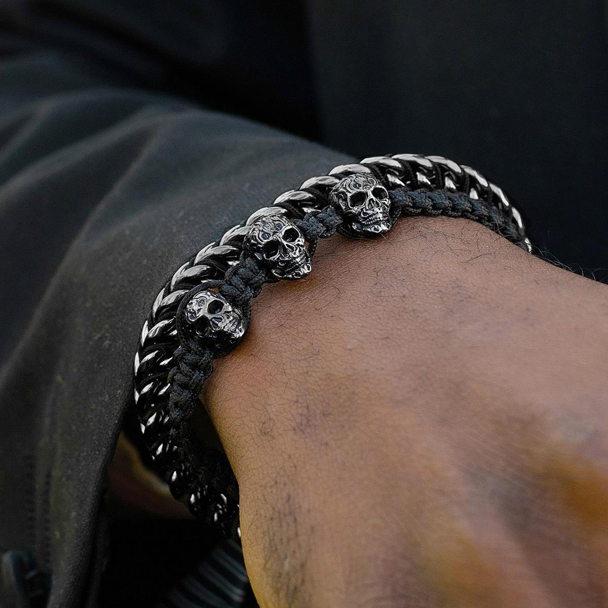 Crucible Jewelry Three Black IP Skulls on Shocker Tie Woven Bracelet