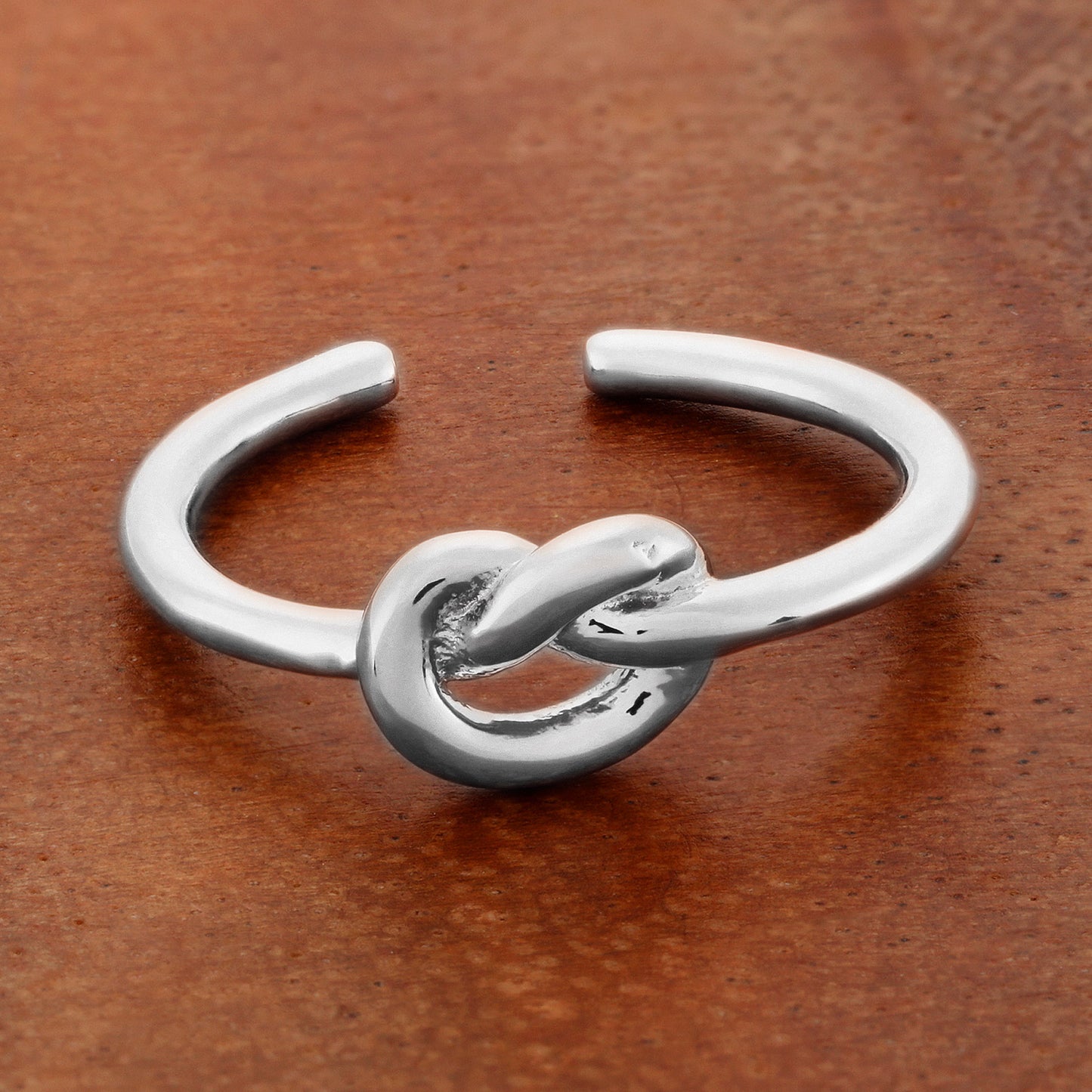 ELYA Polished Love Knot Stainless Steel Open Ring