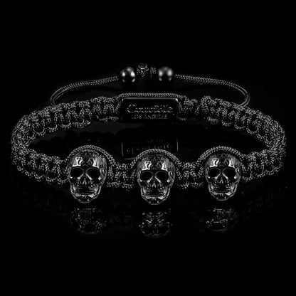 Crucible Triple Skulls on Shocker Tie Woven Bracelet